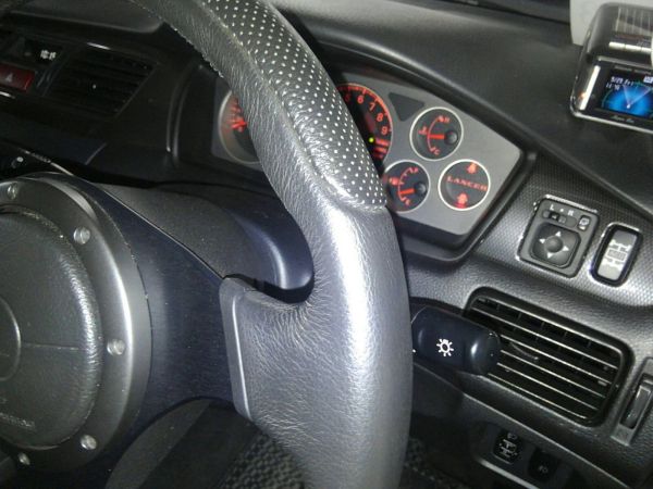 2004 Mitsubishi Lancer EVO 8 MR steering wheel closeup